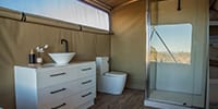Enjoy a full bathroom in our glamping tents