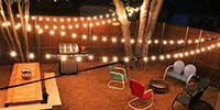 Our glamping sites have string lighting so you can enjoy talking with others after the sun goes down